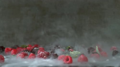 Frozen Mixed Berries Covered with White Smoke