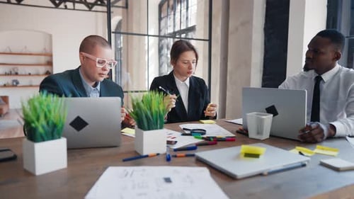 Brainstorm and Teamwork in Office Young People Working Together Coworkers Diverse Women and Man