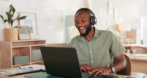 Man Talking on Video Conference Using Laptop