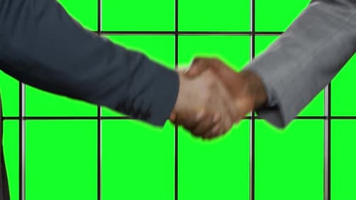 Close Up Handshake Against a Green Screen