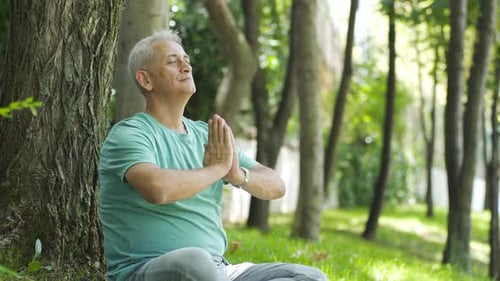 Man meditates, relaxes, calms down.