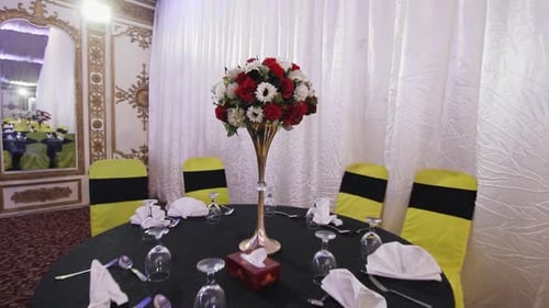 Elegant Wedding Table With Floral Centerpiece and Decor