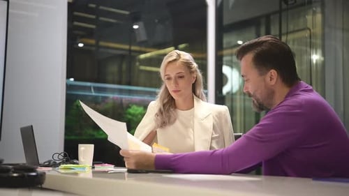Both of businessperson working on a laptop in the office. Business concept
