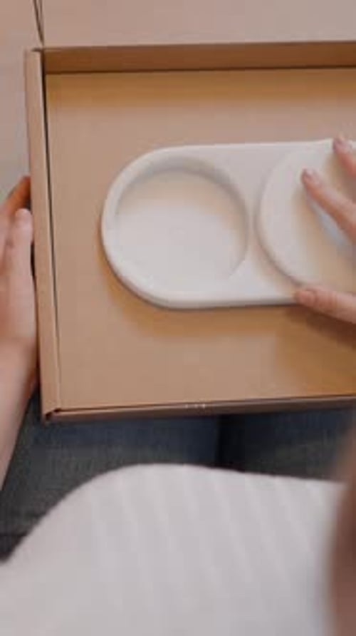 Woman Product Designer Checking If the Cap of Jewellery Box Slides Well Before Packaging Product in
