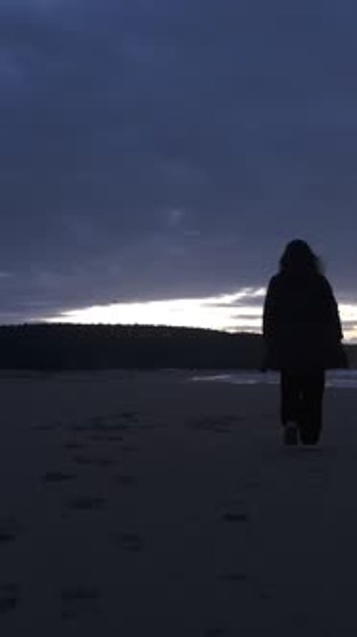 Woman Walking Beach