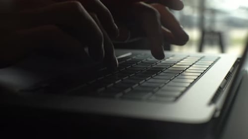 Closeup Cropped Shot of Unrecognizable Man with Credit Card in Hands Making Purchases Online Using