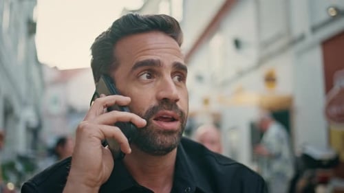 Serious Man Talking Cell Discussing News at City Bar Closeup Freelancer Call