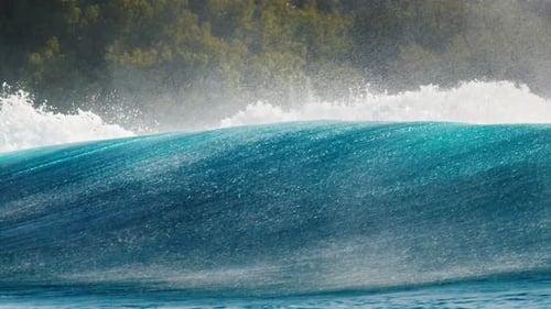 Ocean Wave Rolls and Breaks in the Maldives