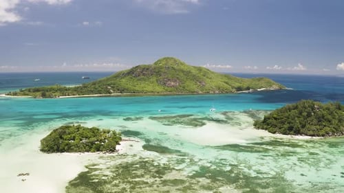 Aerial: Beautiful Turquoise Seascape View of Sunny Seychelles Islands