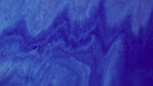 Macro Shot of Shimmering, Vibrant Blue Liquid