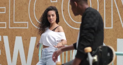 Teenagers socialising outdoors in city