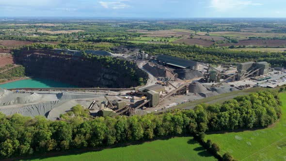 Aerial drone shot of massive quarry pit in Coalville UK showing ...