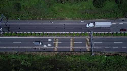 Freeway, highway or motorway with traffic on sunny clear day with all types of motor vehicles. High