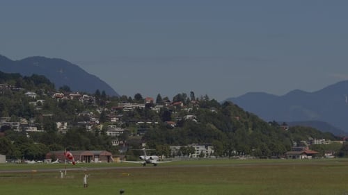 Airplane Taking Off Near Residential Area