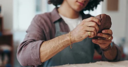 Hands, pottery and sculpting clay with man in workshop closeup for art, crafts or creative hobby