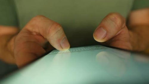 Male Hands Typing a Message on Smartphone Screen