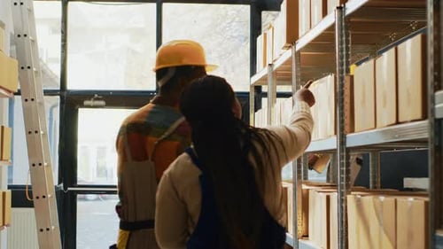 Team of Warehouse Employees Working on Inventory