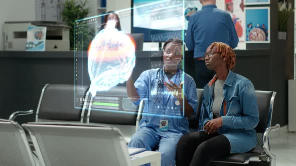 Doctor Explains Hologram to Patient in Hospital Waiting Room, Medical ...