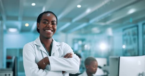 Smiling Scientist in Modern Laboratory Setting