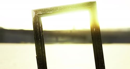 Golden Sunlight Through Rotating Rustic Frame