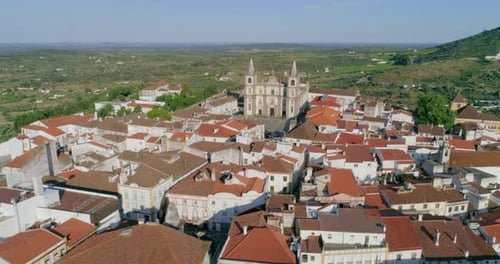 Drone flyover city building towards to Historic Portalegre Cathedral, Portugal