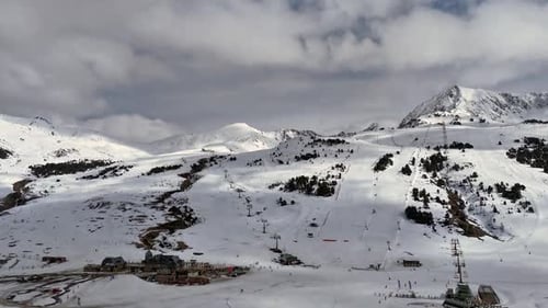 Aerial Drone Timelapse of Baqueira Beret Ski Resort Snowy Pyrenees Mountains with Skiers and