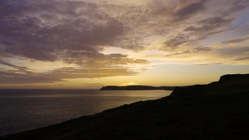 Golden Sunset Over the Ocean Coastline