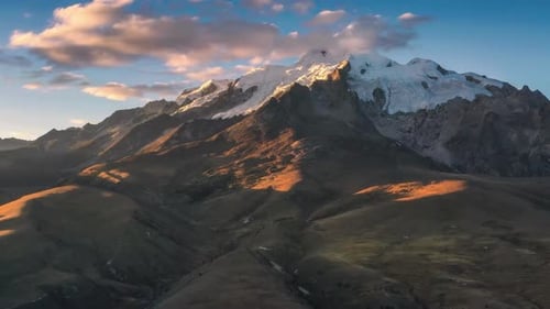 Majestic Mountain Range at Sunrise with Clouds Aerial View