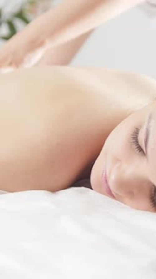 Relaxation Massage for Back Man Rmassaging for Young Blonde Female