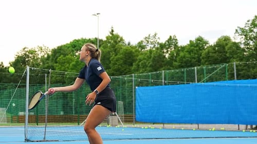 Professional Female Tennis Player Playing the Tennis on Outside Court