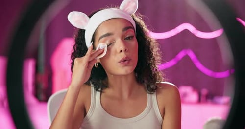 Woman, makeup and ring light for streaming, webcam and beauty for influencer in home