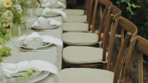 Elegant Wedding Table Setting with Floral Centerpiece