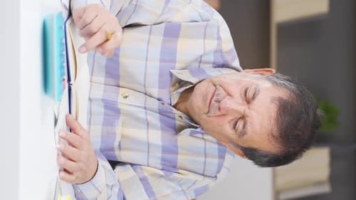 Adult Using Calculator and Counting Money