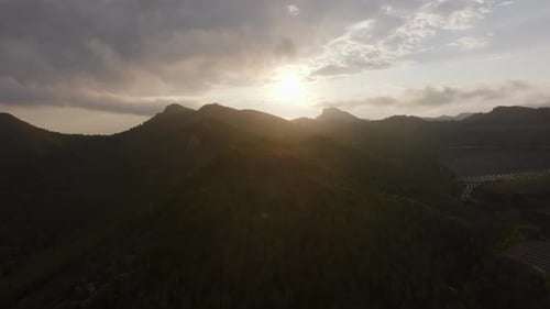 Majestic Sunset Over Green Mountains