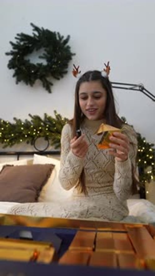 Experience the Festive Holiday Cheer While Indulging in the Delightful Golden Gift Unwrapping