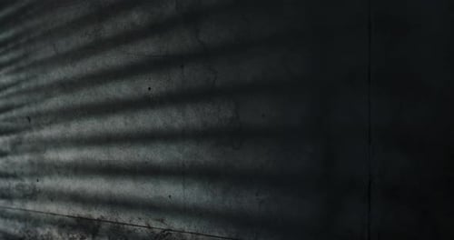 Abstract Shadow Patterns on a Gray Wall