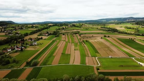 Aerial View of Patterned Agriculture Fields in Rural Landscape