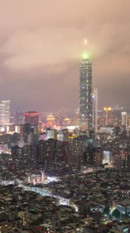 Vertical time Lapse of low clouds above Taipei Taiwan at night