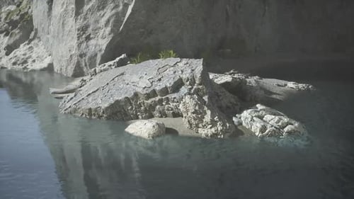 Rocky Outcrop Emerging From Calm Waters at Dusk in Serene Landscape