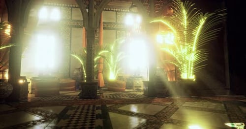 Warm Sunlight Illuminates a Moroccan Courtyard Adorned with Lush Greenery