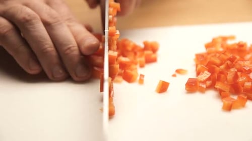 Dicing Red Bell Pepper on Cutting Board