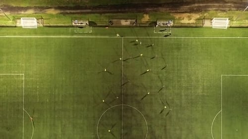 Aerial View of Soccer Practice at Night