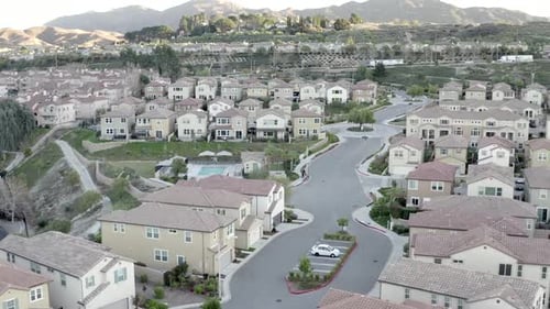 Aerial footage over Santa Clarita residential city suburb, California America