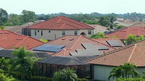 Photovoltaic Solar Panels on Florida Home Roof for Producing Clean Ecological Electric Energy
