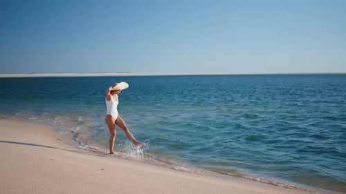 Happy Traveler Walking Waves Spending Summer Vacation on Beach in Straw Hat