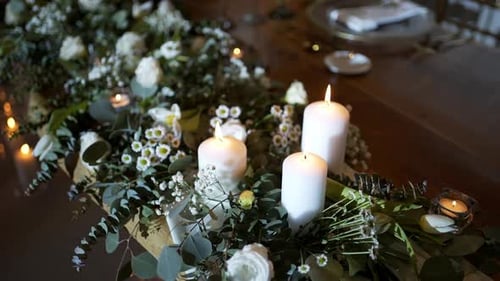 Elegant Wedding Table Decoration with Candles and Flowers