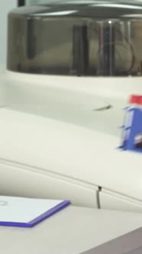 Medical Professional Processing Blood Samples in Lab