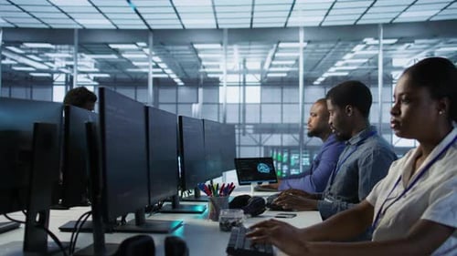 Computer Scientists in Data Center Implementing AI Systems