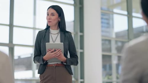 Business Woman Giving Presentation in Modern Office