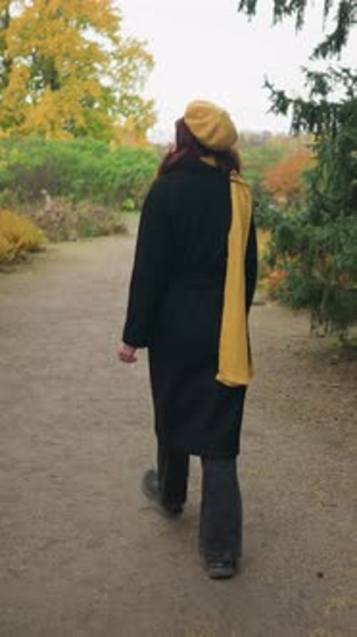Autumn Joy Stylish Lady Turns with Yellow Beret in Garden
